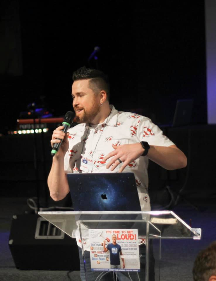 Nate Barbour speaking at a ministry event
